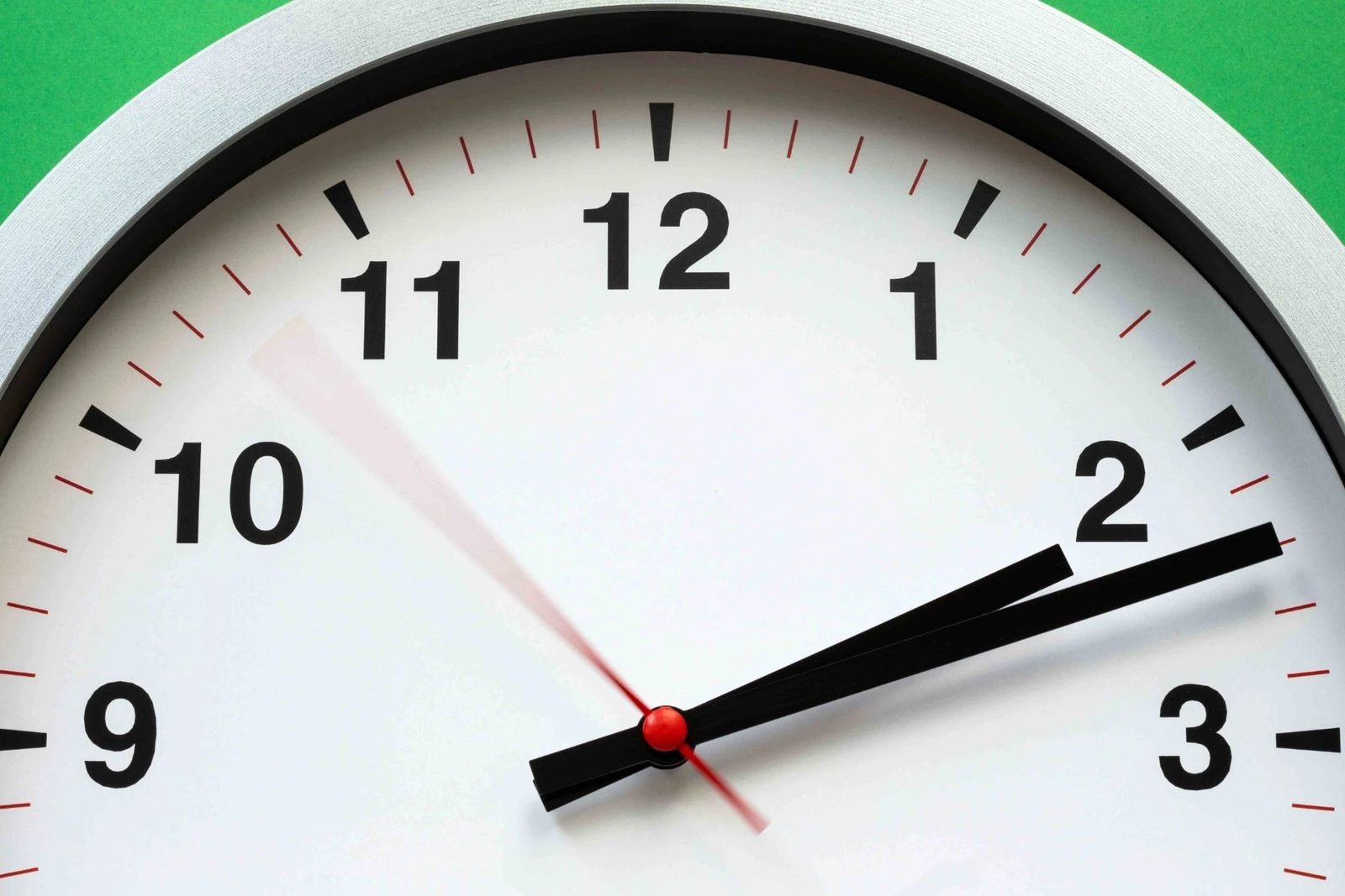 A wall clock with a moving second hand.